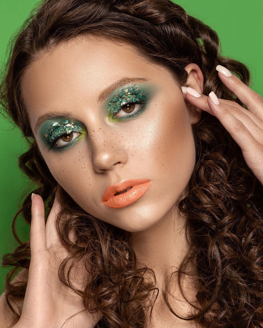 Lady With Creative Make Up And Shining Green Eyeshadows